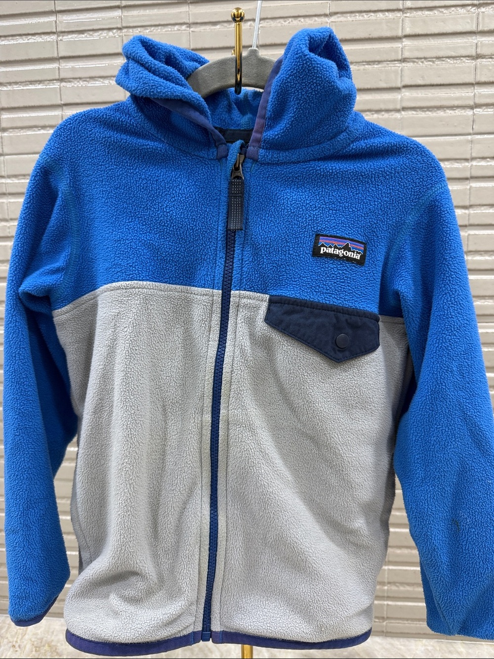 Patagonia Kids Blue and Light Gray Hooded Fleece Jacket with Navy Trim